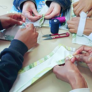 La Lesetsa Hand sewing.